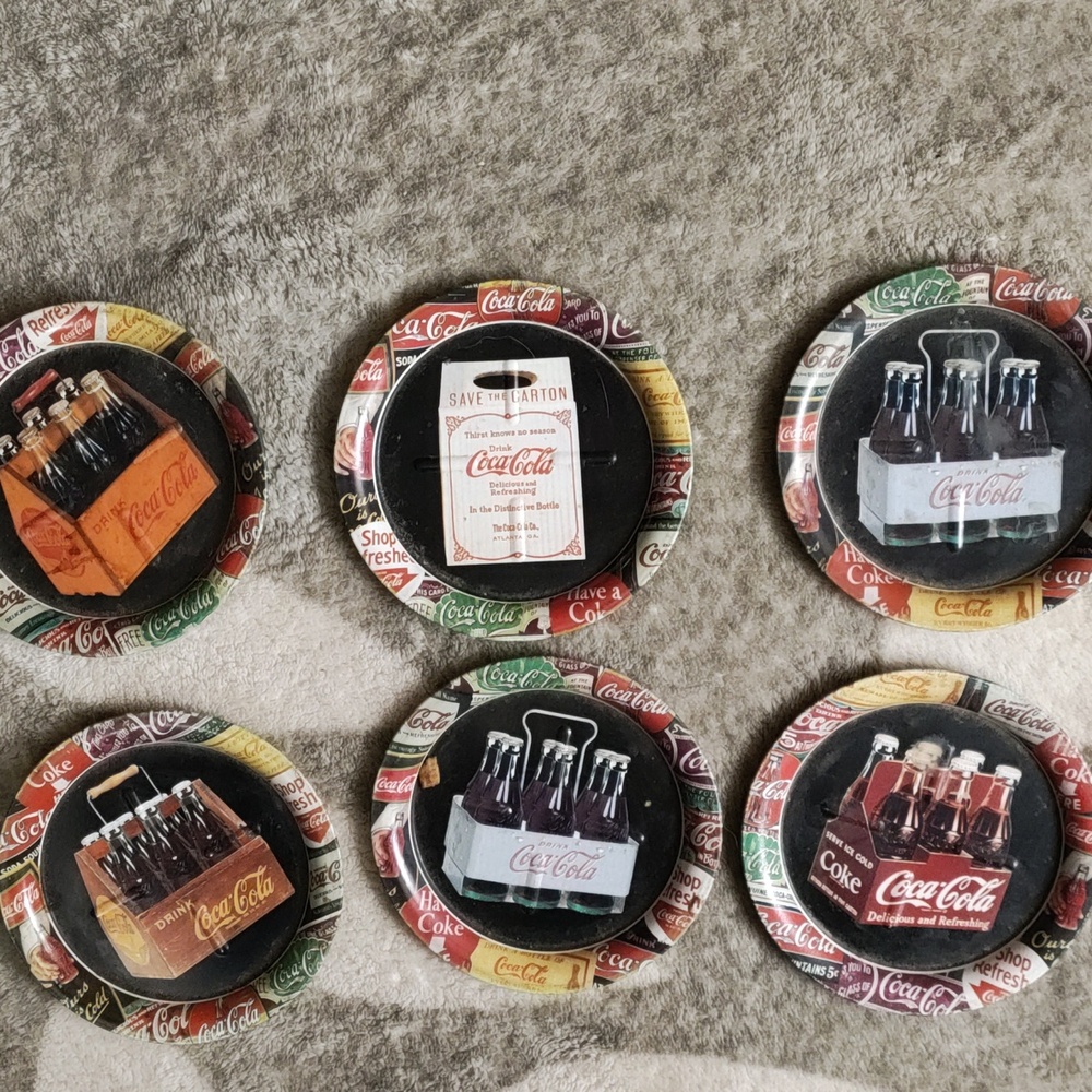 Set of Coca-Cola tin coasters